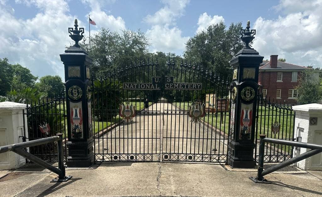 Restored wrought iron entrance gates of Chalmette National Cemetery in Louisiana, originally fabricated in 1872 and restored by blacksmith Darryl Reeves.