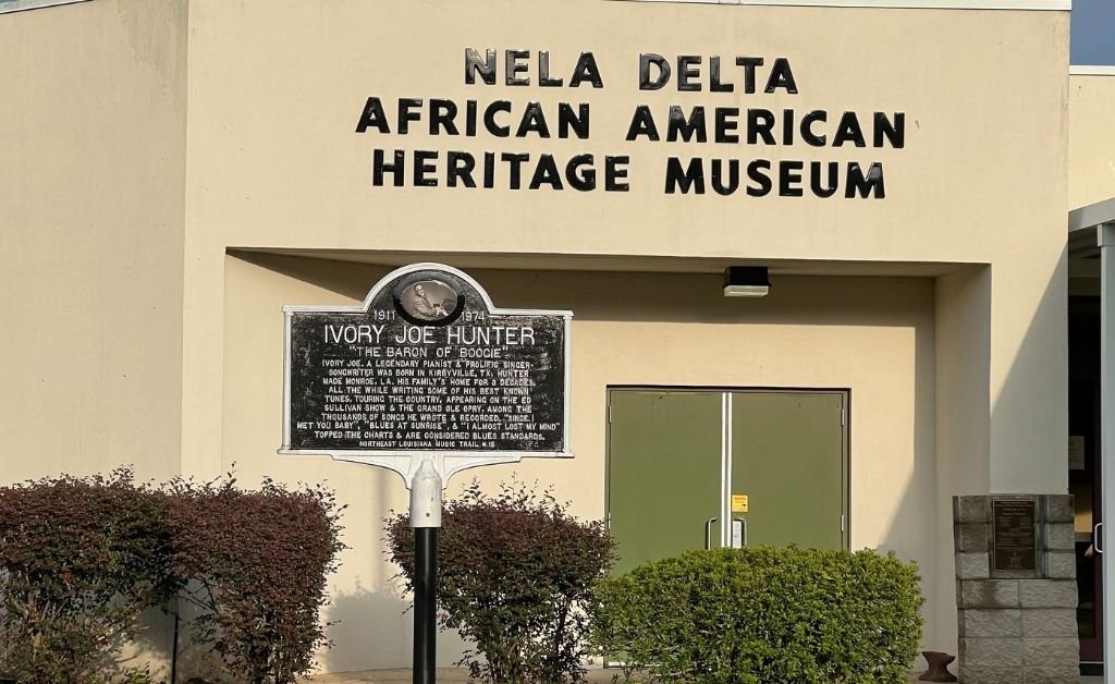 A historical marker for Ivory Joe Hunter stands in front of the NELA Delta African American Heritage Museum in Monroe, Louisiana, honoring the musician’s legacy.