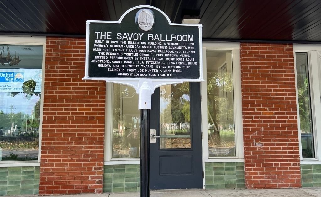 Close-up of the Savoy Ballroom historical marker in Monroe, Louisiana, part of the Northeast Louisiana Music Trail, highlighting its role in the Chitlin’ Circuit and performances by legendary Black artists.