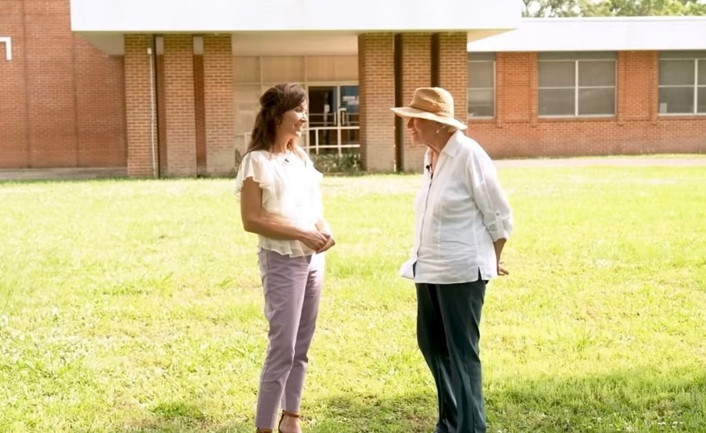 Karen LeBlanc and Mavis Arnaud Fruge stand in conversation outside the future site of St. Luc’s French immersion school in Arnaudville, Louisiana.