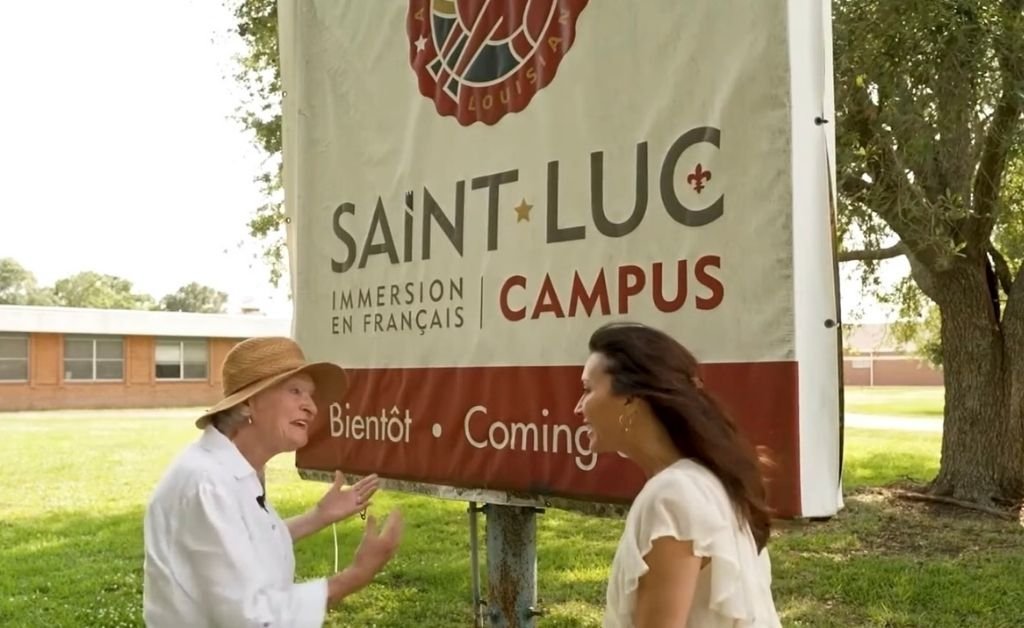 Mavis Arnaud Fruge enthusiastically shows Karen LeBlanc the future site of the Saint-Luc French immersion school in Arnaudville, Louisiana.