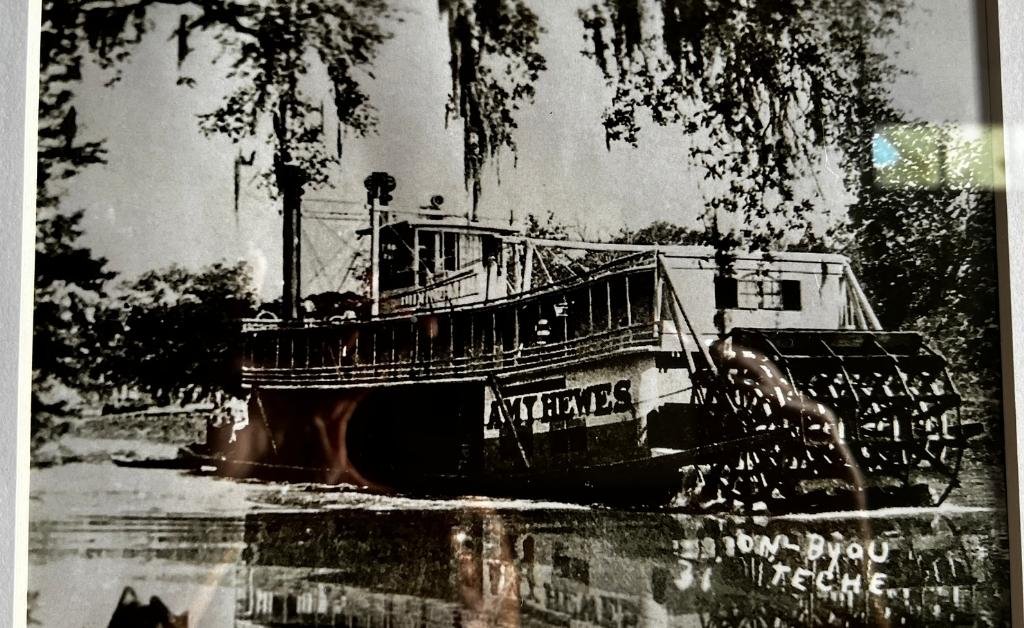 Historic black-and-white photograph of a steamboat on Bayou Courtableau near Washington, Louisiana, reflecting the town’s early river commerce.