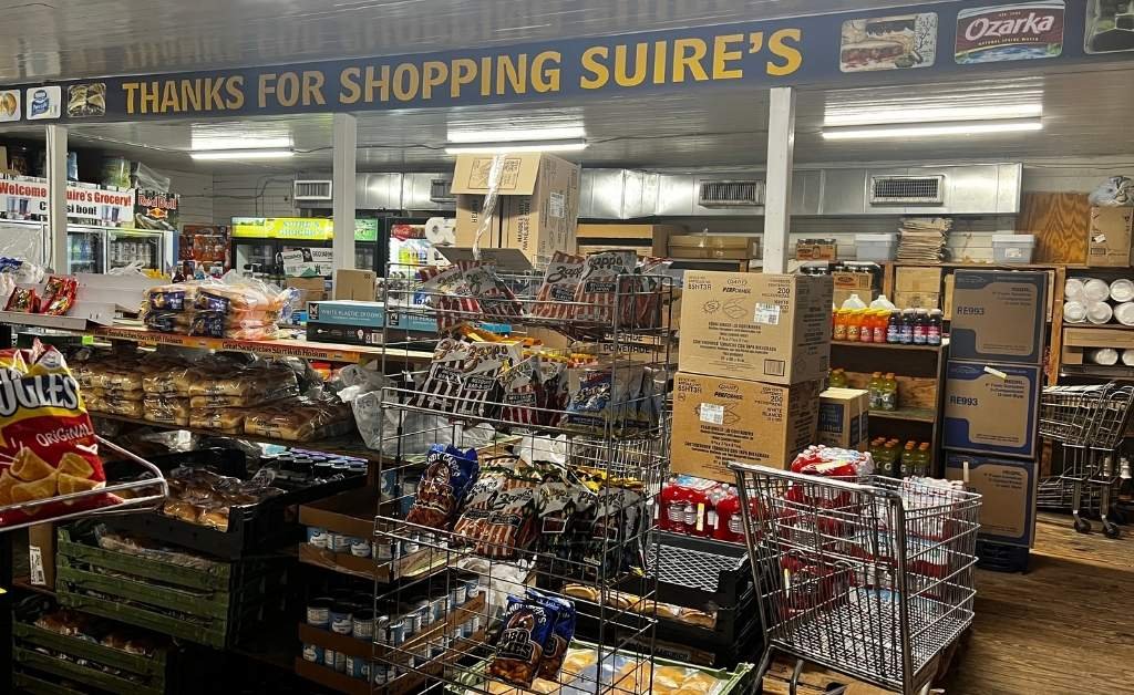 Grocery shelves and snack displays inside Suire's Grocery and Restaurant in Kaplan, Louisiana
