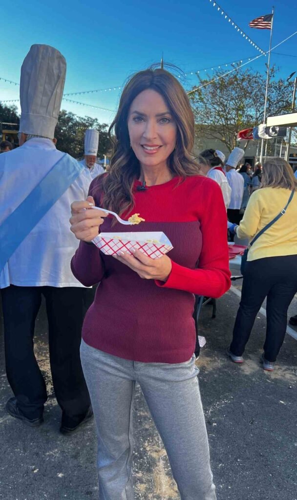 Karen LeBlanc tastes the Cajun giant omelette at the Giant Omelette Celebration in downtown Abbeville, Louisiana.