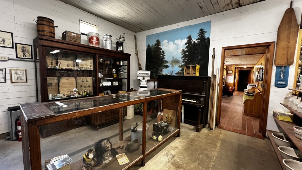 Vintage equipment and antiques displayed inside the historic Donnell's General Store, Louisiana