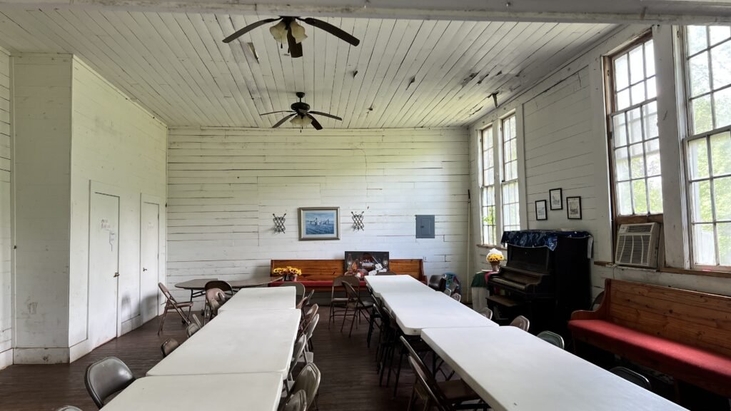 Interior of the Longstreet Rosenwald School showing the tall banks of windows designed for natural light