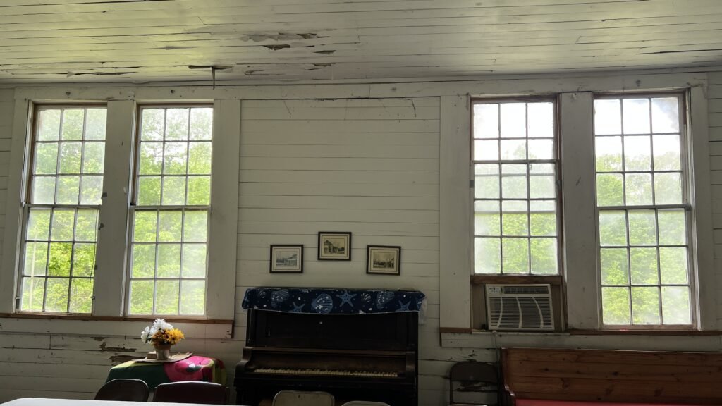 Interior of the Longstreet Rosenwald School showing the tall banks of windows designed for natural light