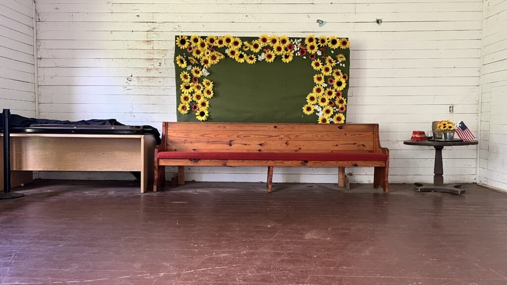 Wooden schoolhouse stage built by family members of Longstreet Rosenwald School students